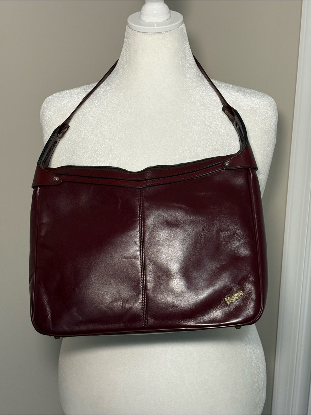 John Romain shoulder bag.